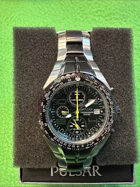 Pulsar Black Dial Watch with Yellow Accents